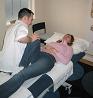 Receiving osteopathic treatment
