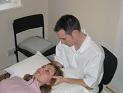 Receiving osteopathic treatment